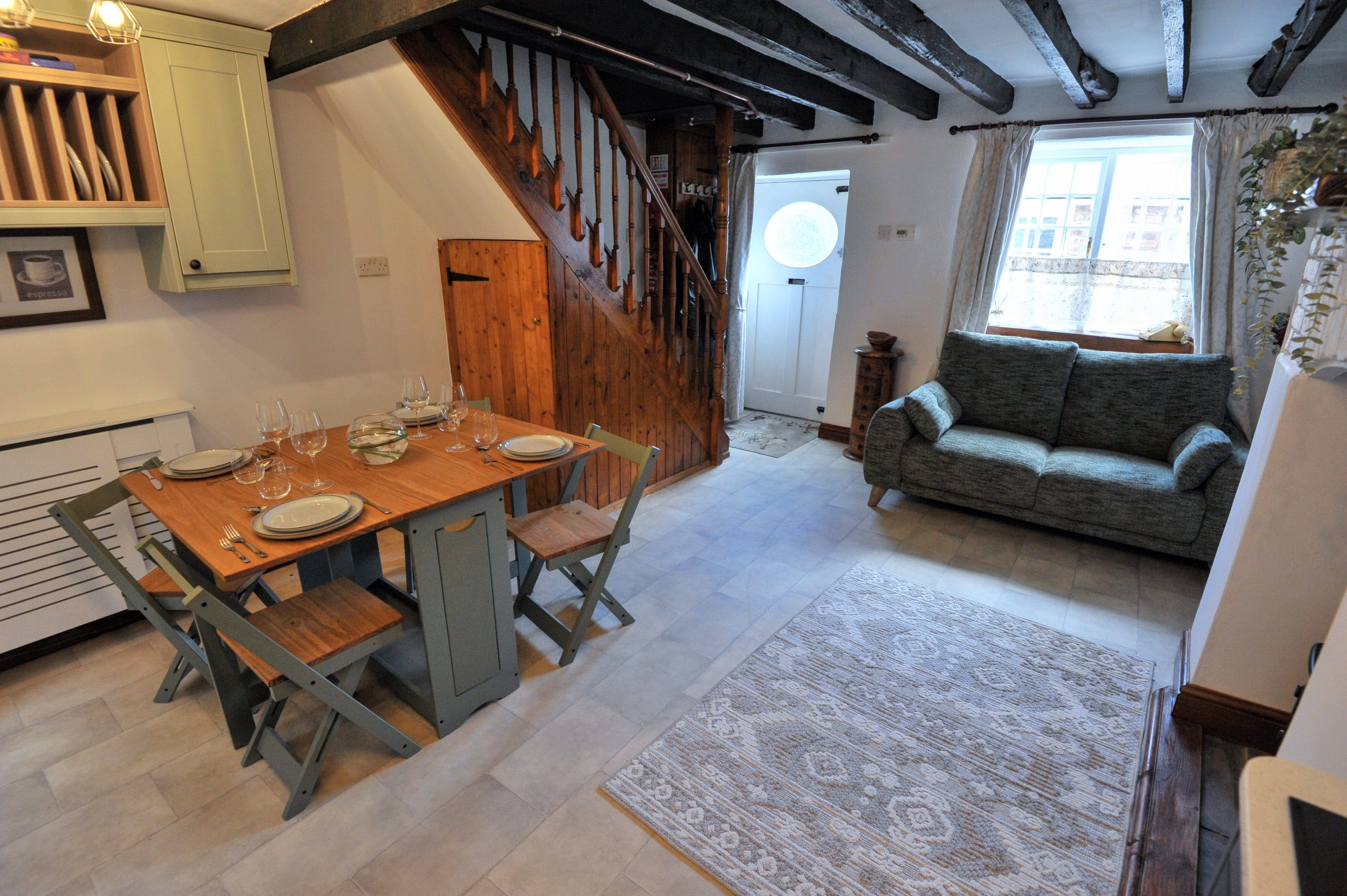 Lounge and dining area at The Little Green Cottage