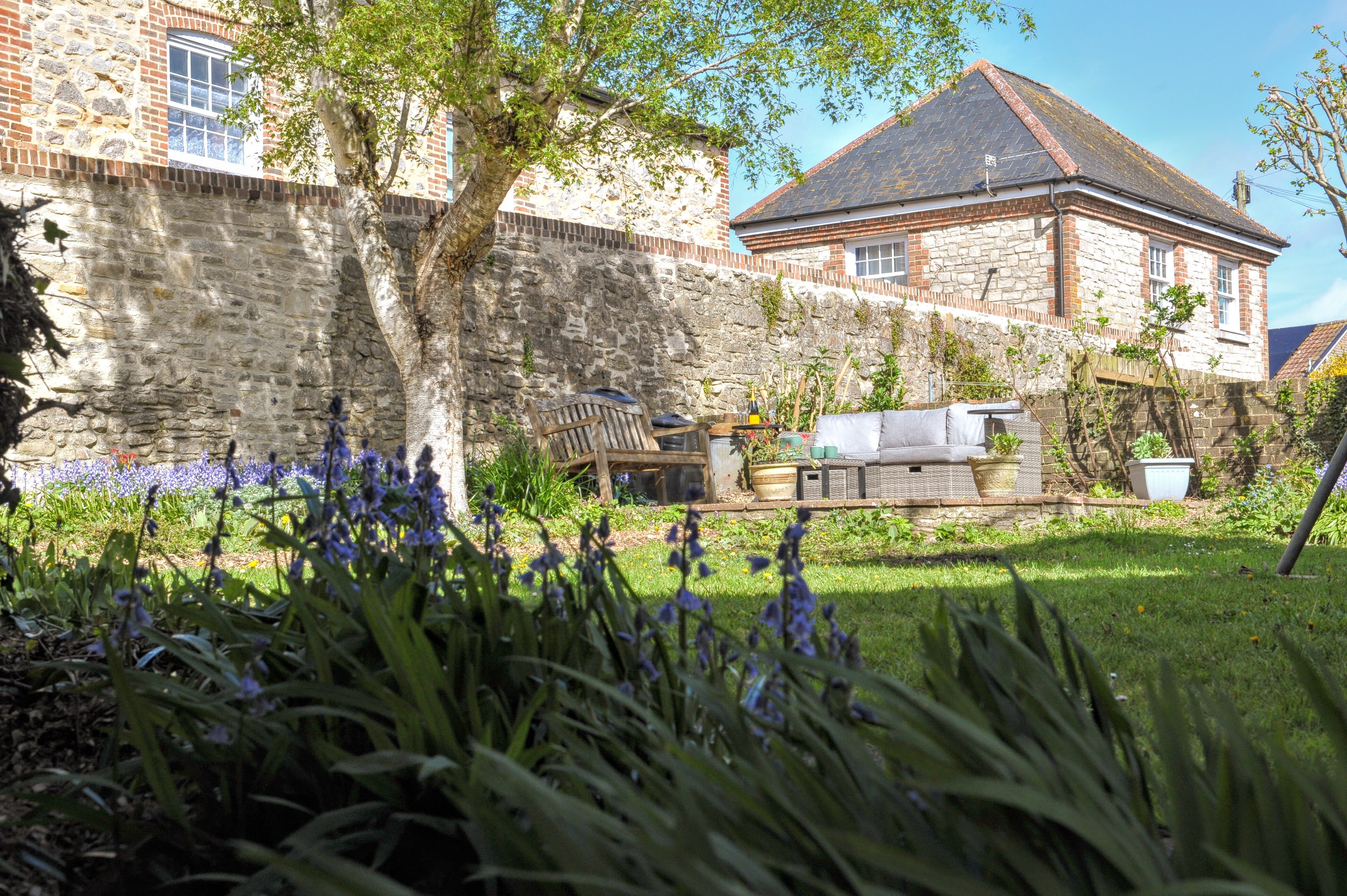 Exterior garden view of The Little Green Cottage
